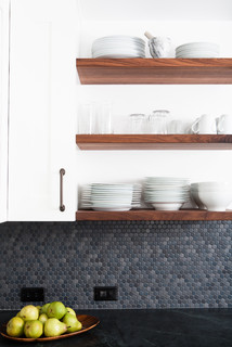 Gray penny tile backsplash adds depth & interest to this home renovations